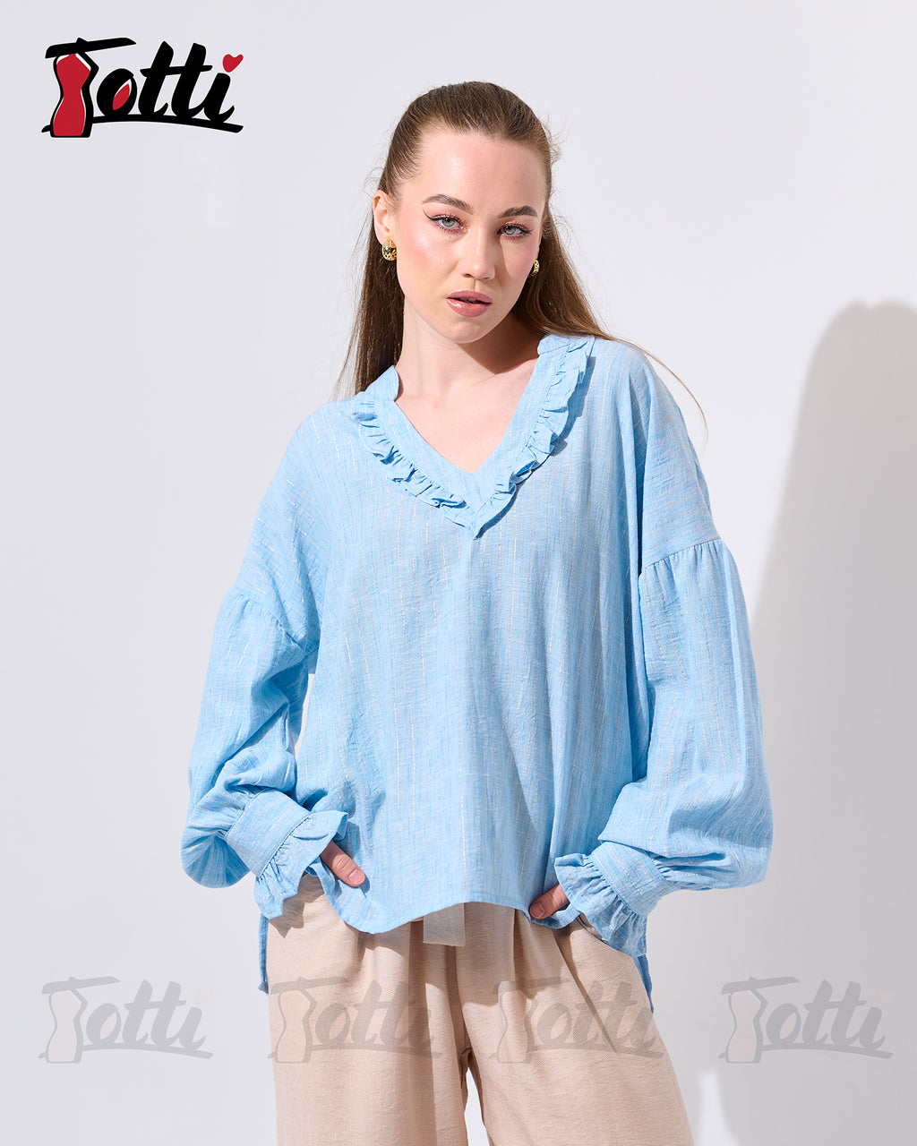 The Light Blue Ruffled V-Neck Blouse