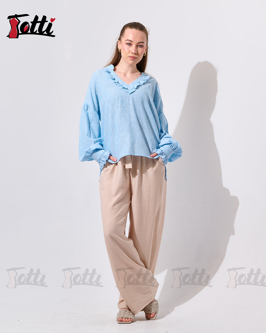 The Light Blue Ruffled V-Neck Blouse