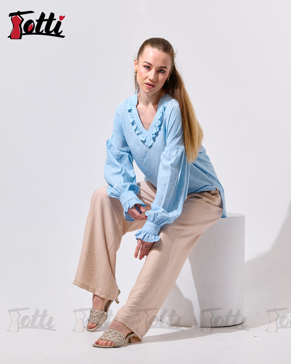 The Light Blue Ruffled V-Neck Blouse