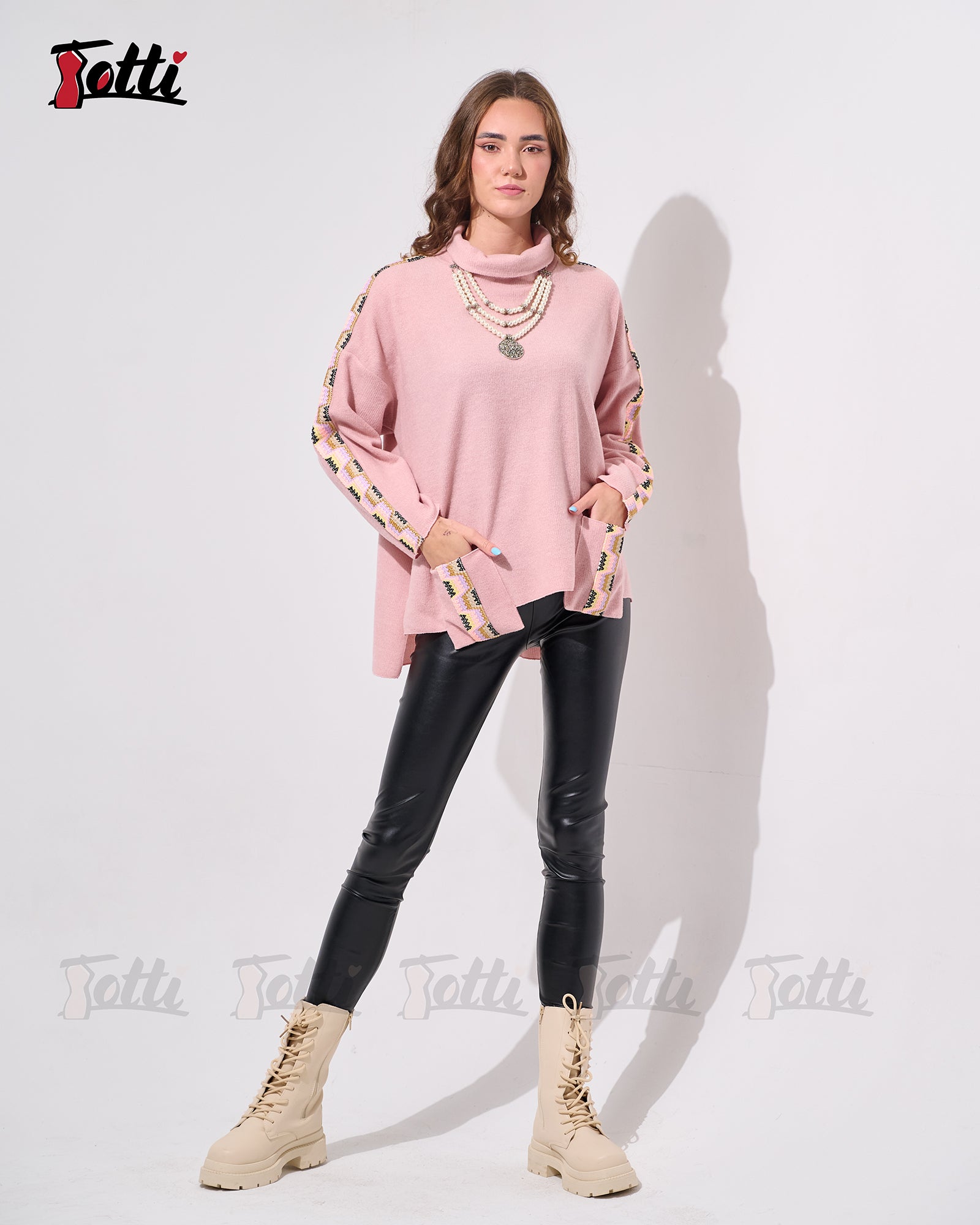 The Dusty Rose Turtel Neck