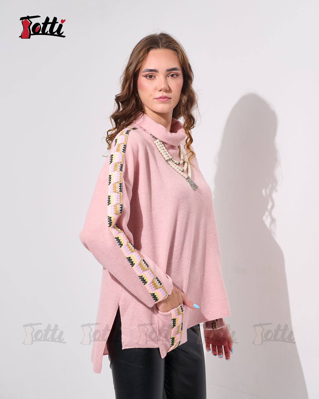 The Dusty Rose Turtel Neck