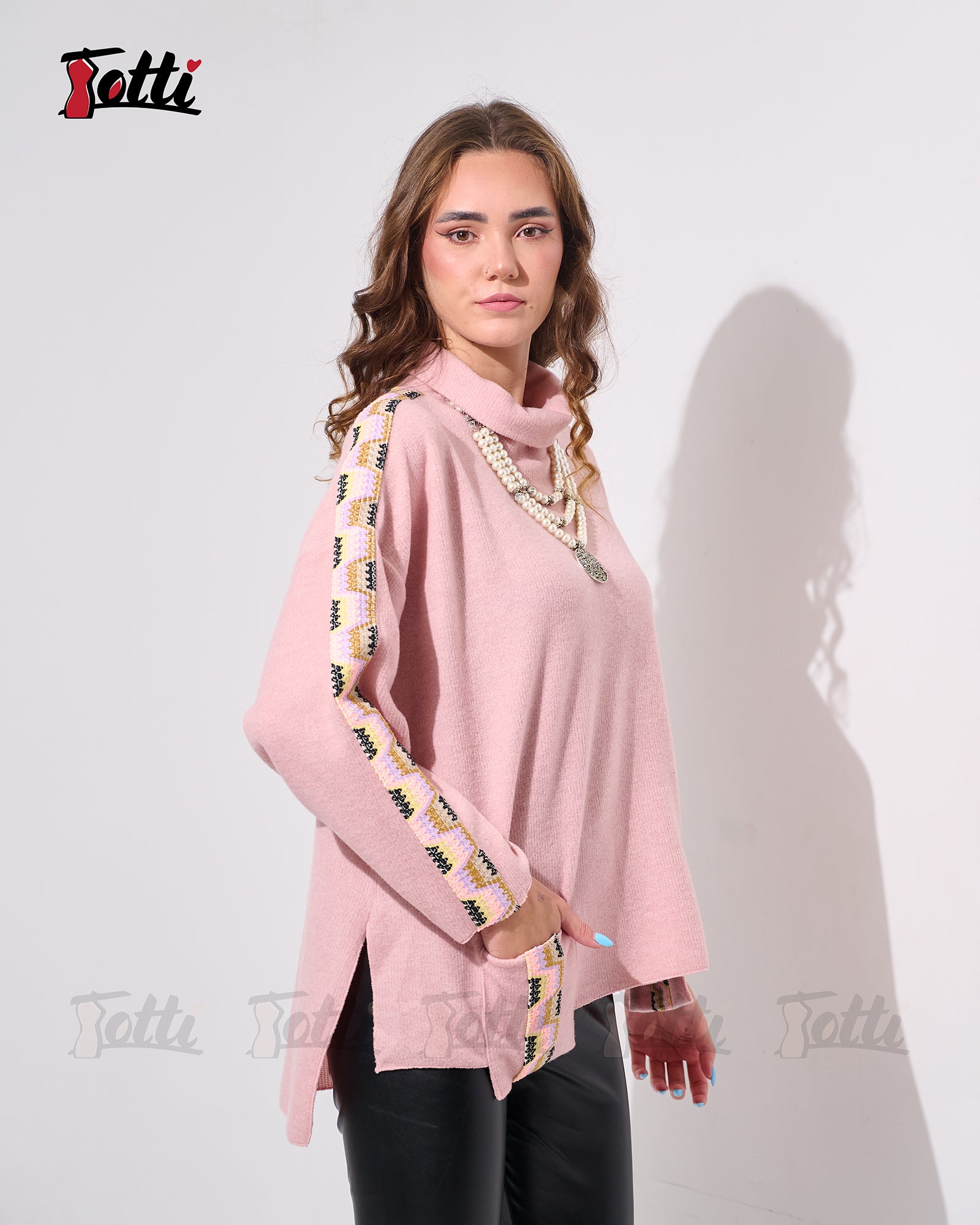 The Dusty Rose Turtel Neck