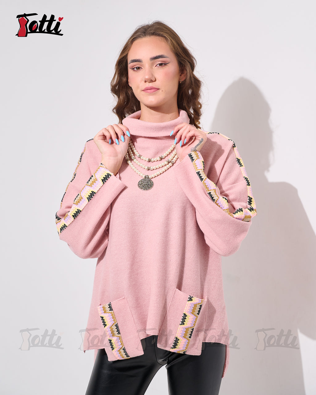 The Dusty Rose Turtel Neck