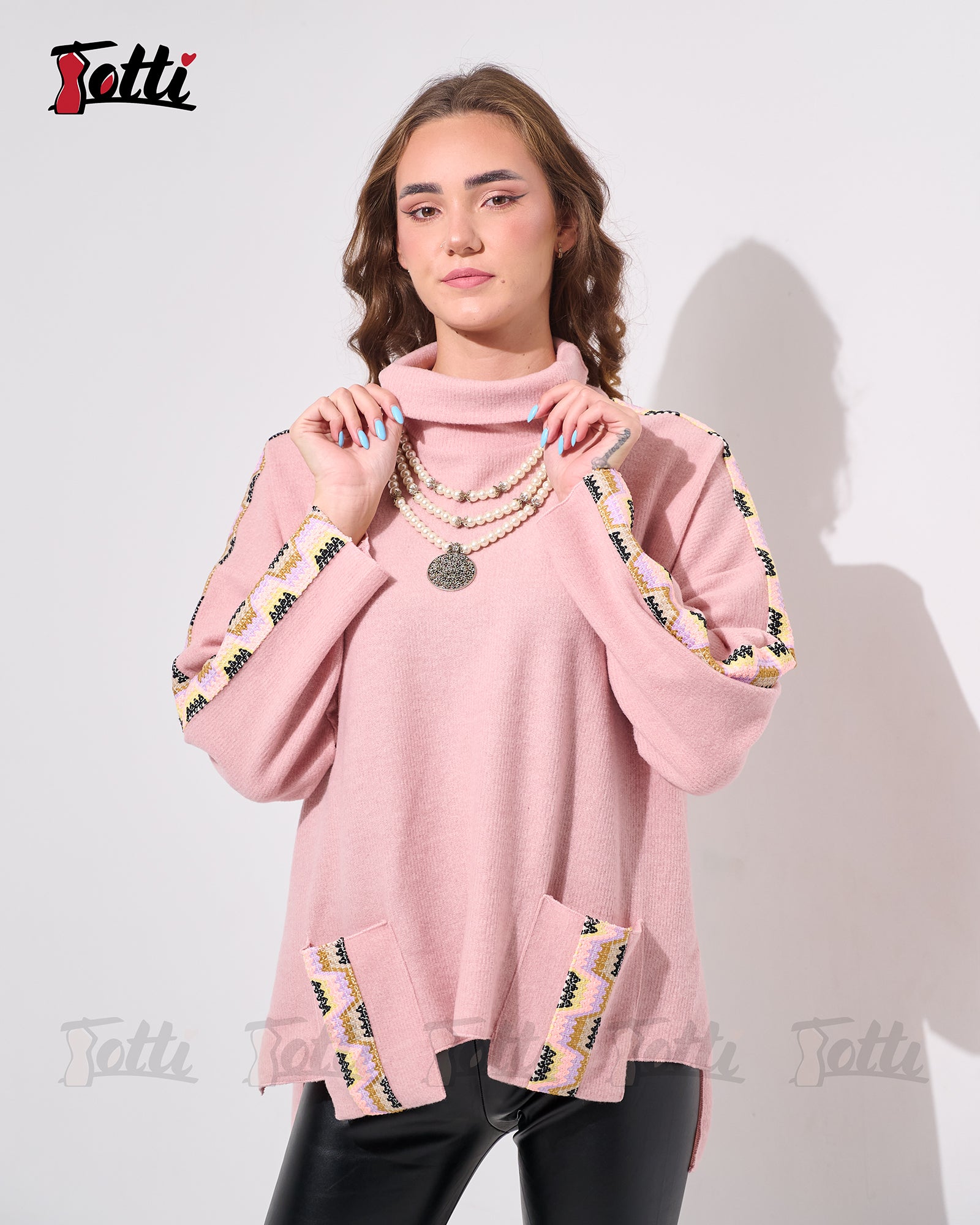 The Dusty Rose Turtel Neck